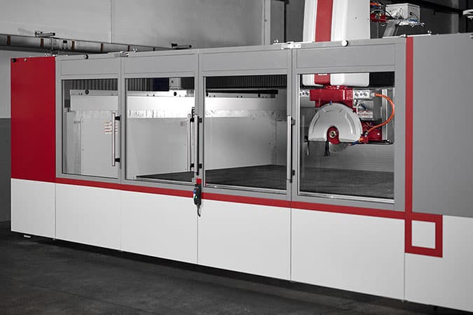 Breton Genya 5-axis bridge saw cutting stone in fabrication shop